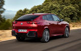 2024 BMW iX2 rear quarter 2024 BMW iX2 rear quarter