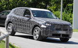2024 BMW X3 front side driving 2024 BMW X3 front side driving