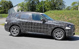 2024 BMW X3 side driving 2024 BMW X3 side driving