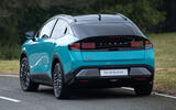2026 Nissan Leaf rear quarter tracking cornering 2026 Nissan Leaf rear quarter tracking cornering