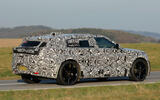 2026 Range Rover Velar EV testing camo rear quarter tracking 2026 Range Rover Velar EV testing camo rear quarter tracking