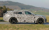 2026 Range Rover Velar EV testing camo side tracking 2026 Range Rover Velar EV testing camo side tracking