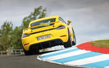 The Porsche Cayman GT4 offers more outright grip on the track, but also costs £11,000 more Porsche Cayman GT4