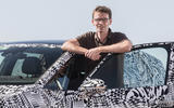Frank Welsch with development car Frank Welsch with development car