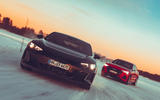 85 audi e tron gt audi e tron sportback drifiting front sunset 85 audi e tron gt audi e tron sportback drifiting front sunset