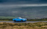 Cyan Volvo P1800 drive - on the road side Cyan Volvo P1800 drive - on the road side