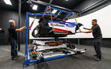Technicians working on simulator Technicians working on simulator