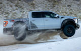 90 2023 F 150 Raptor R exterior Avalanche Gray jumping