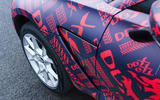 2020 Aston Martin DBX camouflaged prototype ride - side aero