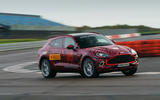 2020 Aston Martin DBX camouflaged prototype ride - cornering front