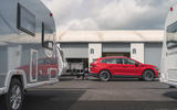97 skoda enyaq iv 80 towing caravan baileys factory side view