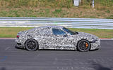 Audi E-tron GT camo track driving - side