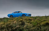 Cyan Volvo P1800 drive - hero side