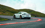 Porsche 718 Cayman GT4 driving - rear