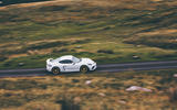 Porsche 718 Cayman GT4 driving - side