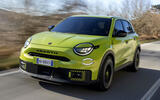 Abarth 600e green front quarter tracking