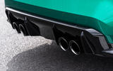 The BMW M3 and M4's large diffuser and quad tailpipes leave a lasting impression The BMW M3 and M4's large diffuser and quad tailpipes leave a lasting impression