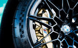 BMW M Compound six-piston fixed-caliper brakes deliver impressive stopping power