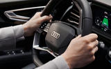 The Audi Q4 e-tron's steering wheel uses advanced touch controls with haptic feedback The Audi Q4 e-tron's steering wheel uses advanced touch controls with haptic feedback