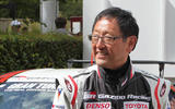 akio toyoda in racing suit