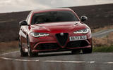 alfa romeo giulia qv review 2024 01 cornering front alfa romeo giulia qv review 2024 01 cornering front