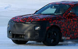 Alfa Romeo Stelvio 2025 camo front quarter close