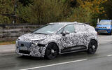 Audi prototype camo front quarter tracking wide