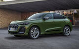 Audi Q5 Sportback   green version outside a house Audi Q5 Sportback   green version outside a house