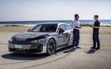 Audi RS E tron GT parked with peolpe Audi RS E tron GT parked with peolpe