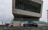 The stark concrete slops of the Liverpool Museum are the perfect backdrop for the Audi e-tron GT AudiGT Promotedstory ROADTRIP DAWN 1d