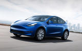 Tesla Model Y on the road blue