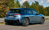 BMW iX 2025 xDrive 60 M Sport rear qtr tracking