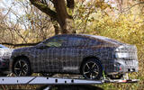 BMW iX4 camo rear quarter