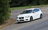 BMW M135i 2012 front quarter slide BMW M135i 2012 front quarter slide