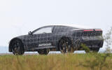 BMW Neue Klasse coupe camouflaged rear quarter cornering