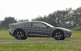 BMW Neue Klasse coupe camouflaged side tracking BMW Neue Klasse coupe camouflaged side tracking