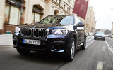BMW X3 PHEV official press images - on the road