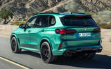 BMW X5M driving rear BMW X5M driving rear