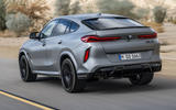 BMW X6M driving rear BMW X6M driving rear