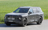 BMW X7 2027 camo front quarter