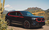 BMW XM Label Red 2023 front quarter static cactus BMW XM Label Red 2023 front quarter static cactus