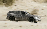BMW iX3 prototype testing in South Africa   panning, side