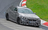 bmw m5 touring front three quarter right