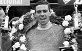 Clark with wreath and trophy