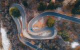 Ferrari Purosangue birds eye driving JH