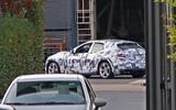 Ferrari SUV mule rear side Ferrari SUV mule rear side