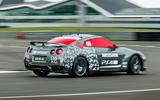 Driving the remote-controlled Nissan GT-R/C