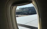Ground crew waving plane goodbye Tokyo airport