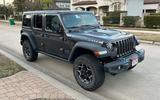 Jeep Wrangler front three quarter ducking Jeep Wrangler front three quarter ducking