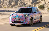 Mini Aceman camouflaged front quarter driving Mini Aceman camouflaged front quarter driving